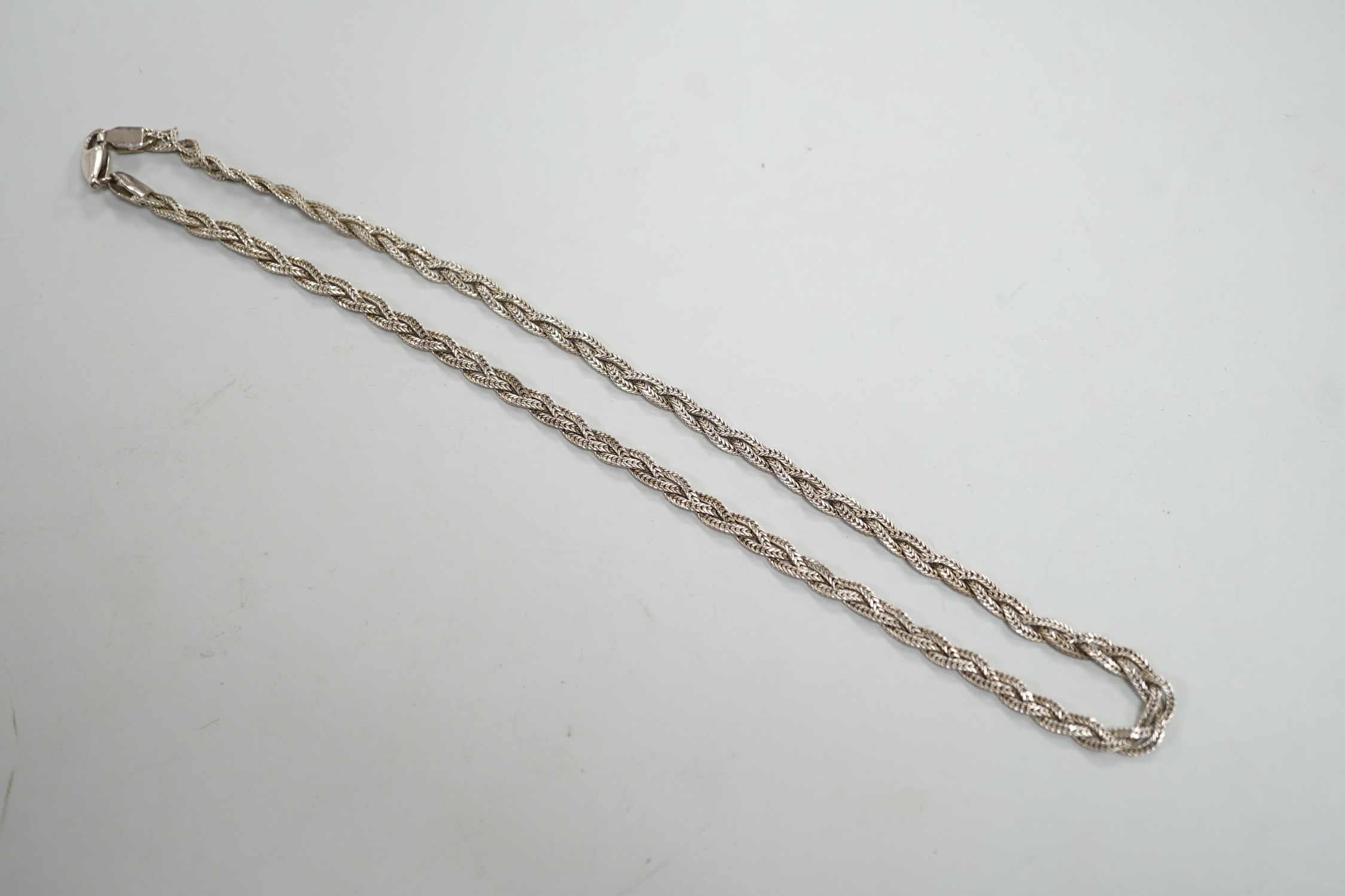 A cased modern interwoven silver necklace, 44cm.